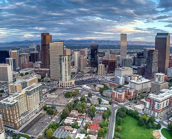 denver skyline with rocky mountains in the background 